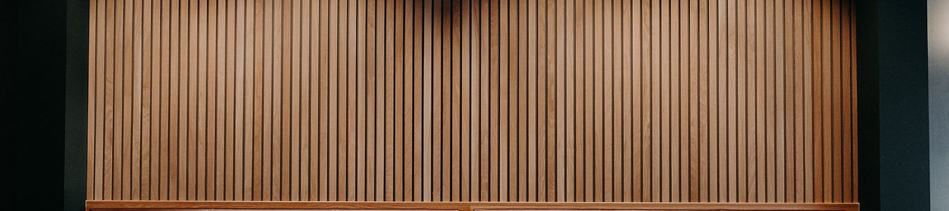 Close-up of wood slats and cabinetry in a home interior
